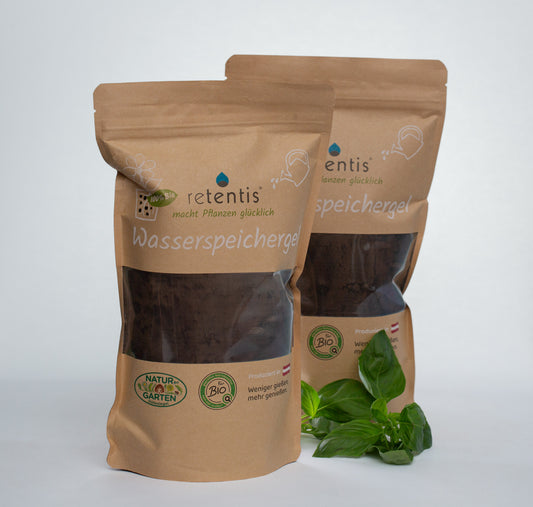 Agrobiogel hydrogel soil water retention product in resealable brown pouches with green leaves nearby